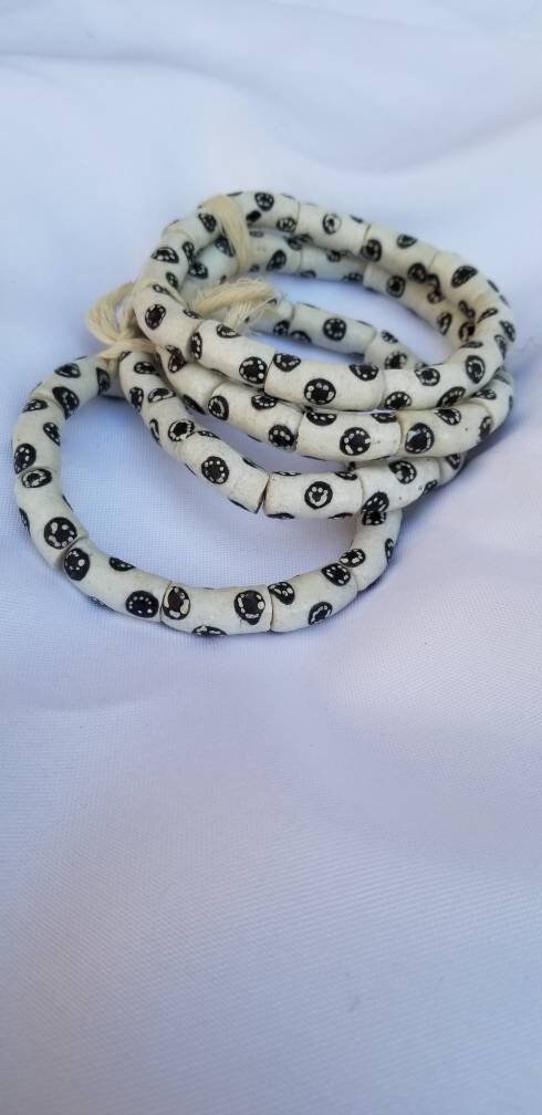 10 pieces of black and white Krobo beads