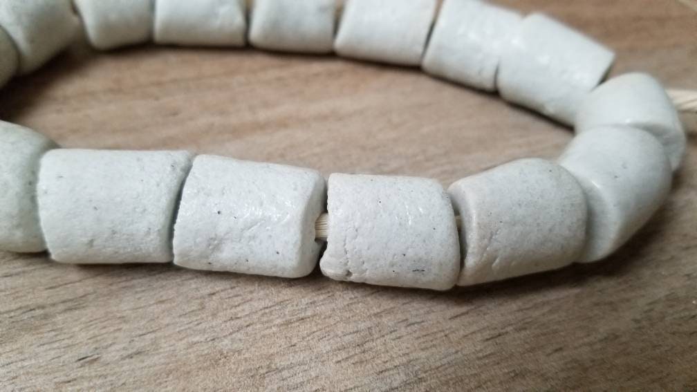 14 White African Powdered Glass Beads