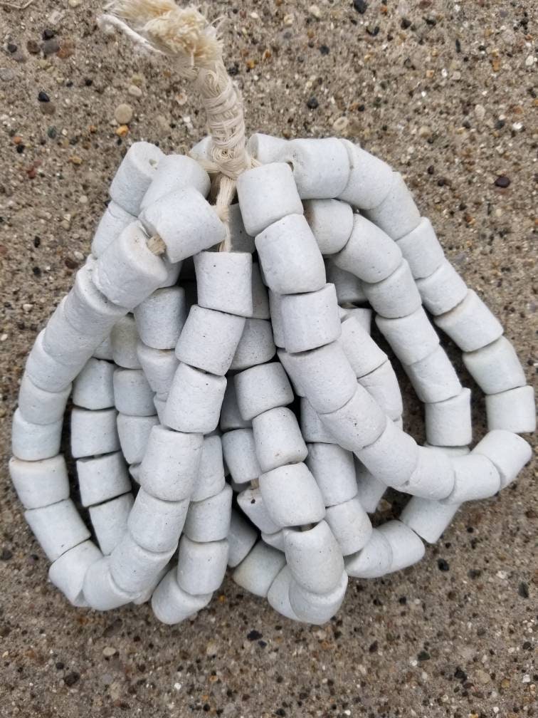 14 White African Powdered Glass Beads