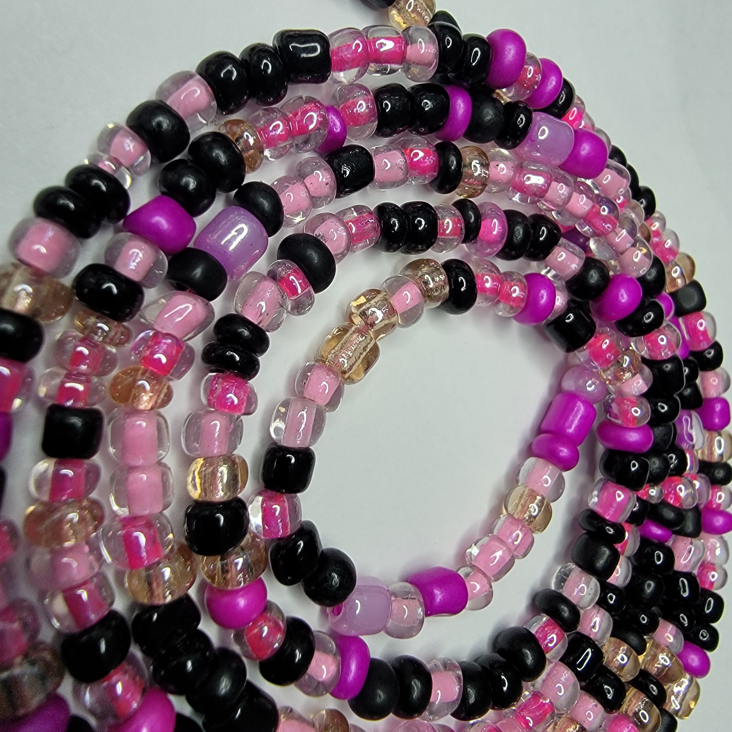 Pink, black tie on waist beads